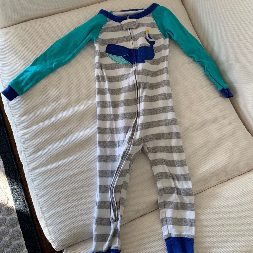 3 sets of zip up footless Carter’s pajamas